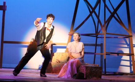 Alex Kurth as Curly McLain and Lily Rogers as Laurey Williams perform a scene during dress rehearsal for the Chelmsford High Theatre Guild's production of "Oklahoma!"