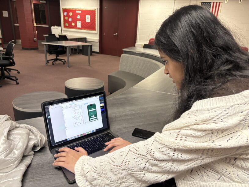 Chelmsford High School junior Reya Kannan shows how she has been coding her new app, Yard2Yum, which won her the Congressional App Challenge in Massachusetts's Third Congressional District.