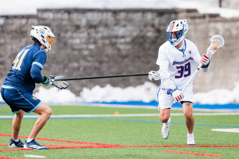 Chelmsford native Alex Lafreniere competing on the UMass Lowell men’s lacrosse team.