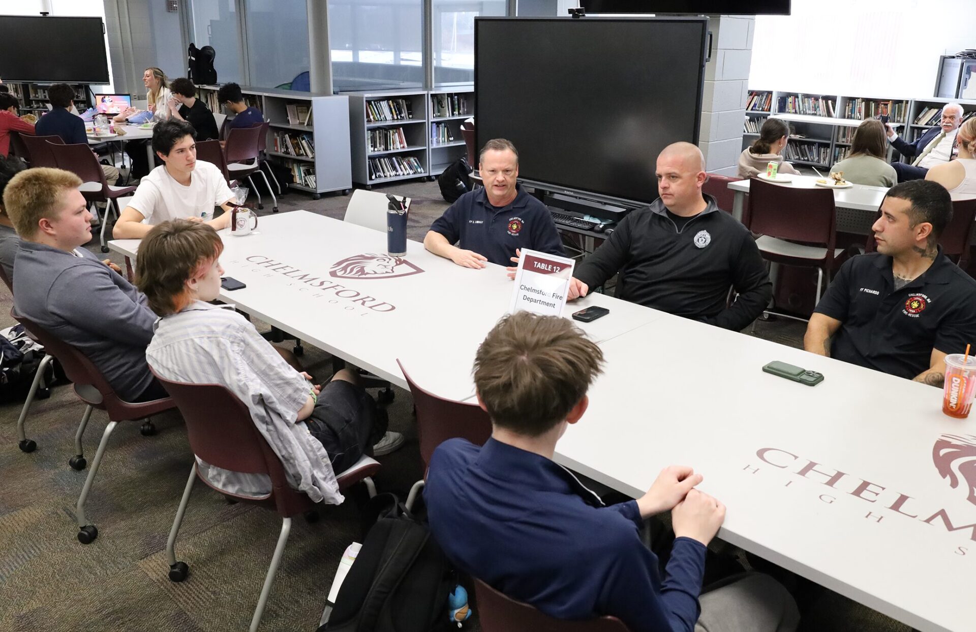 Chelmsford High School juniors attend the annual Career Exploration Breakfast, meeting with professionals to learn more about careers that interest them.