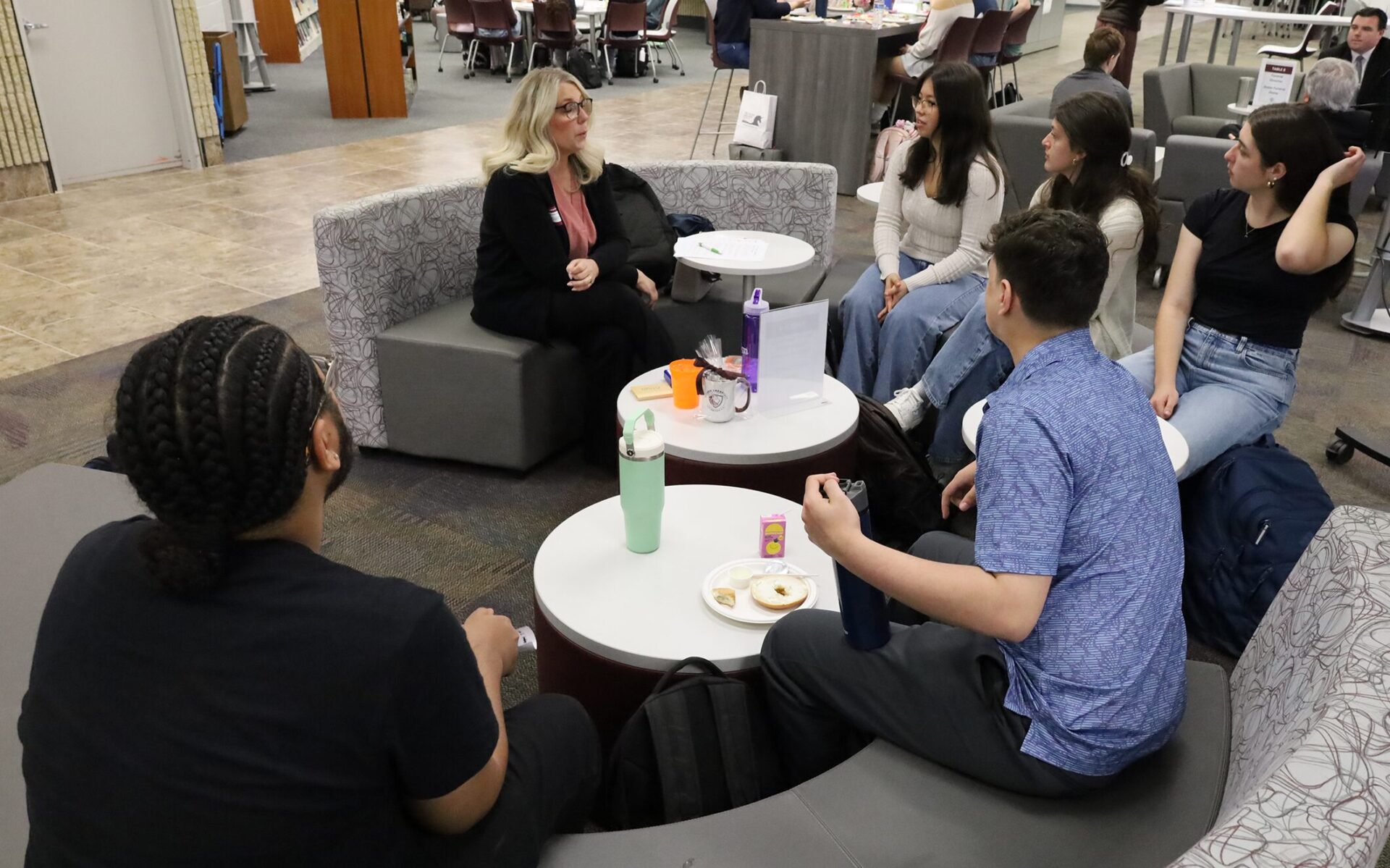Chelmsford High School juniors attend the annual Career Exploration Breakfast, meeting with professionals to learn more about careers that interest them.