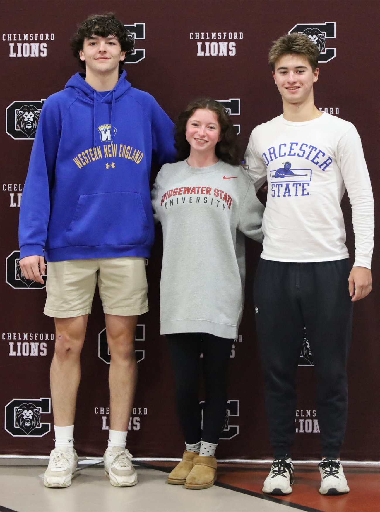 Student-athletes from Emerson House pose for a photo following Chelmsford High School's NLI & Commitment Signing Day on Tuesday, May 12, 2026.
