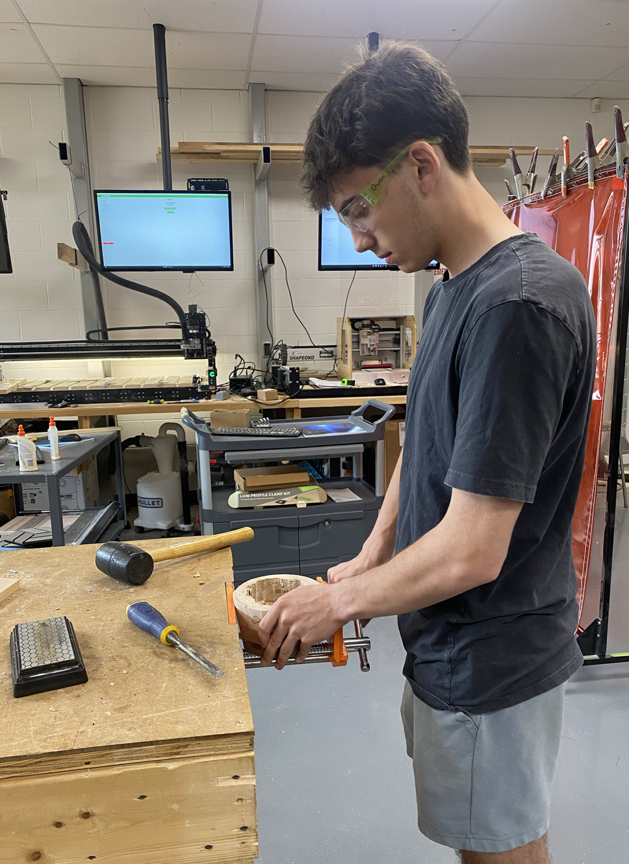 Students in Woodworking classes at Chelmsford High School work on their projects.