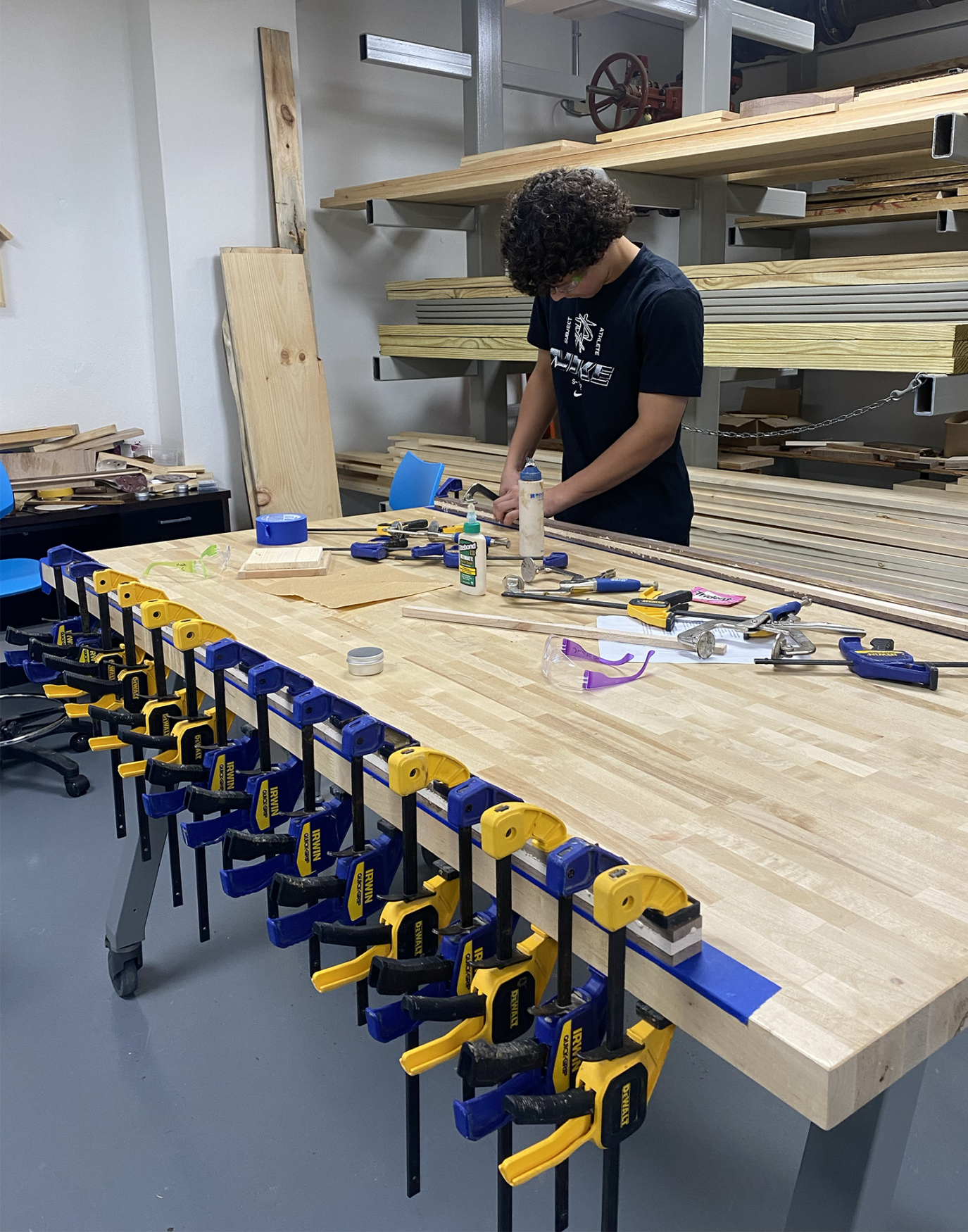 Students in Woodworking classes at Chelmsford High School work on their projects.