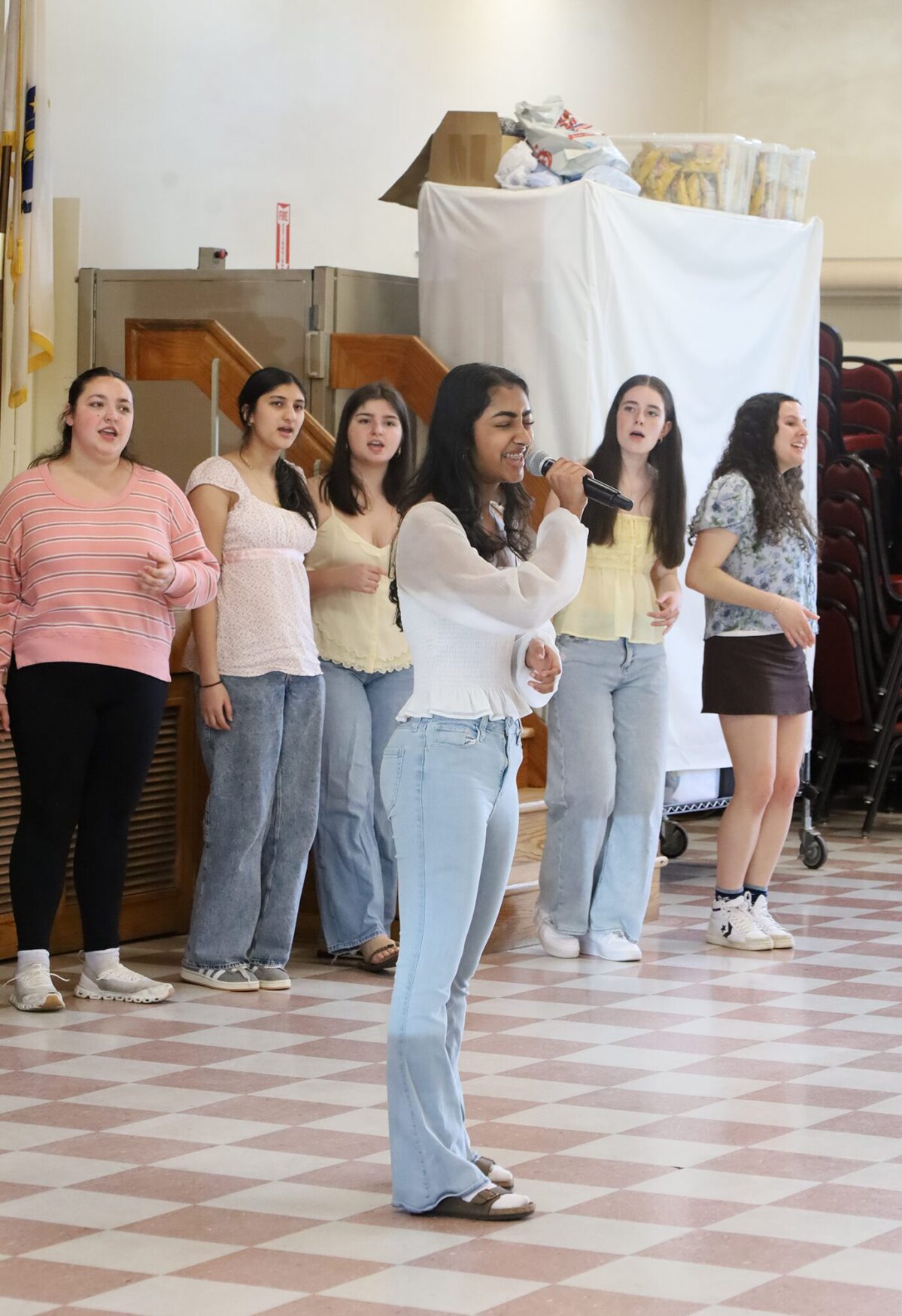 Chelmsford High School a cappella group The Crescendos perform for senior citizens at the Chelmsford Council on Aging on Friday, May 8, 2026.