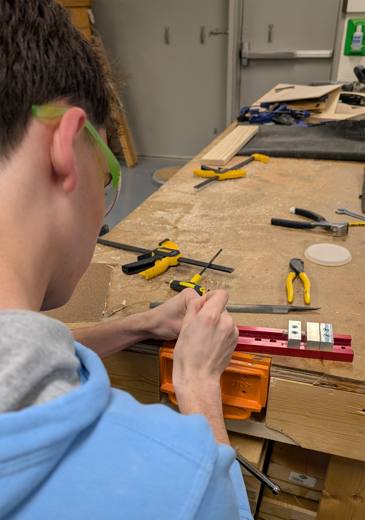 Students in Woodworking classes at Chelmsford High School work on their projects.