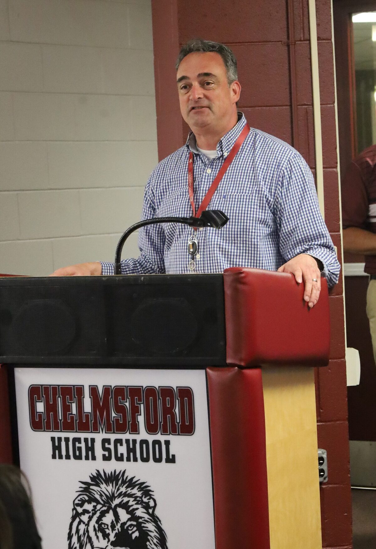 Chelmsford High School principal Stephen Murray shares some thoughts with the 17 future teachers and their families during Signing Day on May 22, 2026.