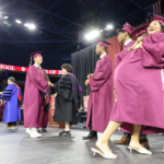 The graduates of Chelmsford High School's Class of 2026 make their way through the receiving line after receiving their diplomas on June 6, 2026.