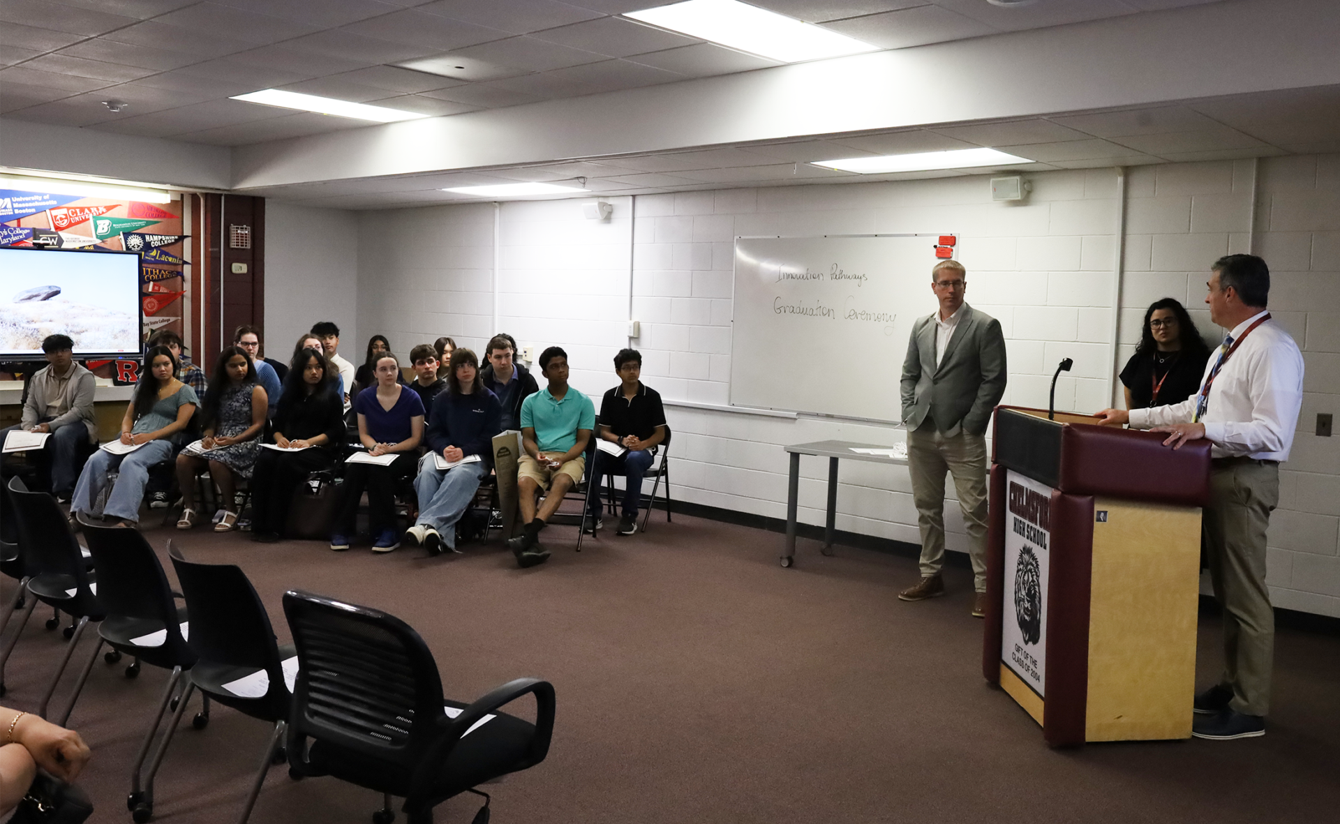 Principal Stephen Murray, far right, addresses the seniors who participated in Chelmsford High School's Innovation Pathways Graduation Ceremony on May 28, 2026.