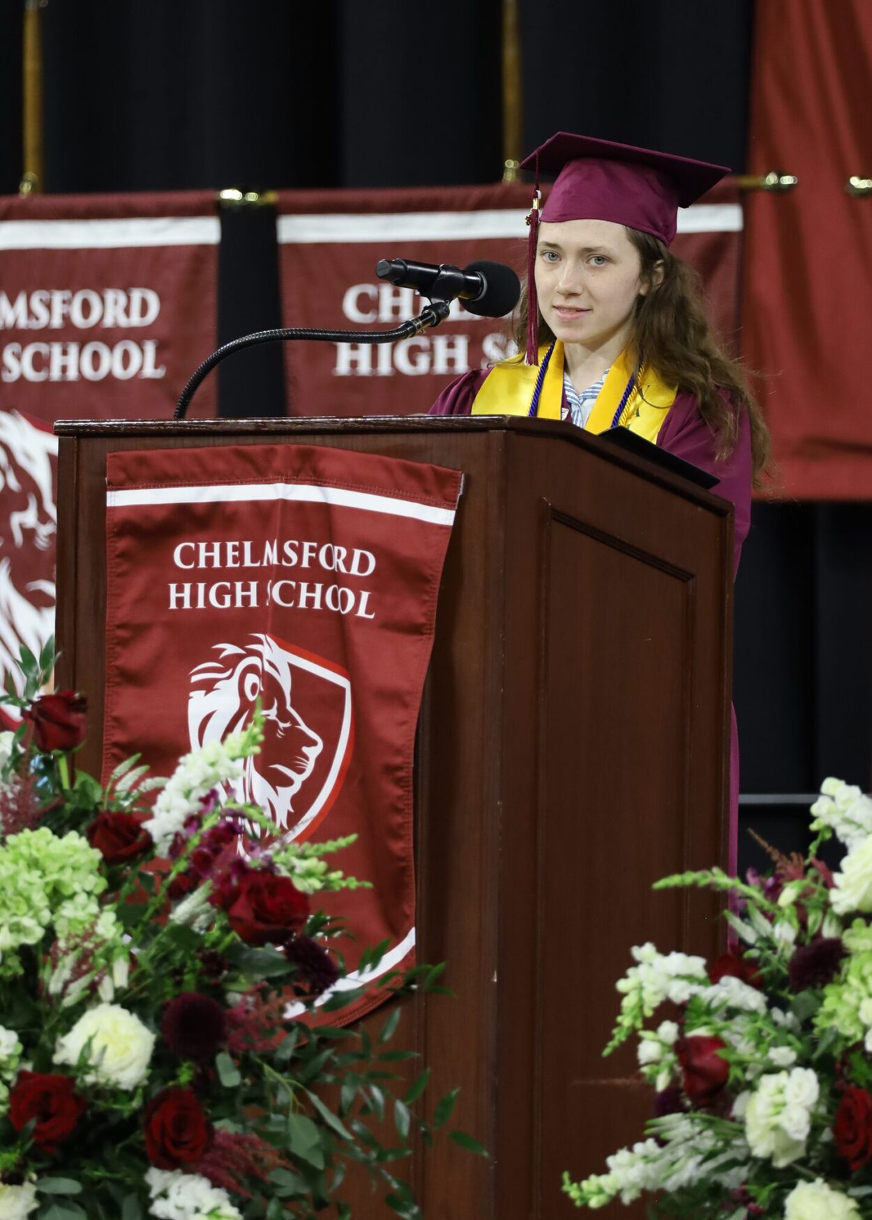 Kate Evans Val Valedictorian Katherine Evans gives her address to those gathered for the graduation of Chelmsford High School's Class of 2026 on June 6.