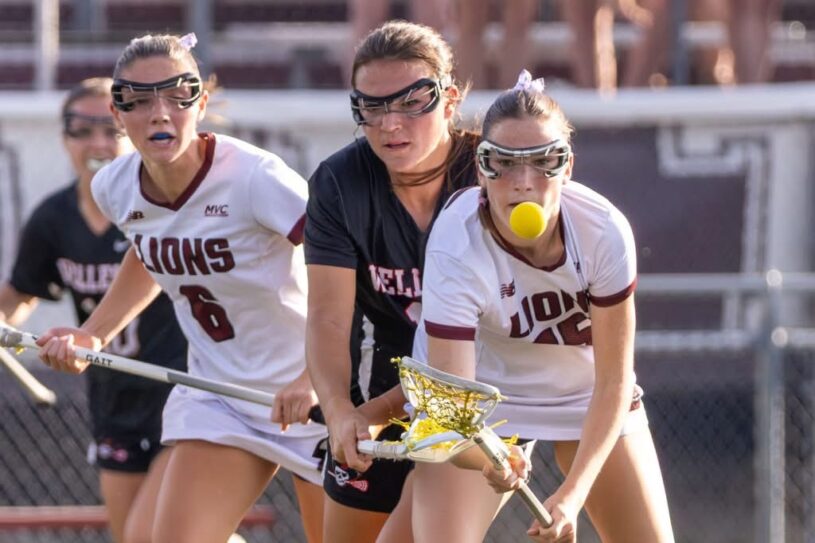 Chelmsford’s Marykate McDonald, front, and Wellesley’s Tara Battaglino battle for a loose ball during Chelmsford’s 7-6 girls lacrosse win on June 3, 2026.