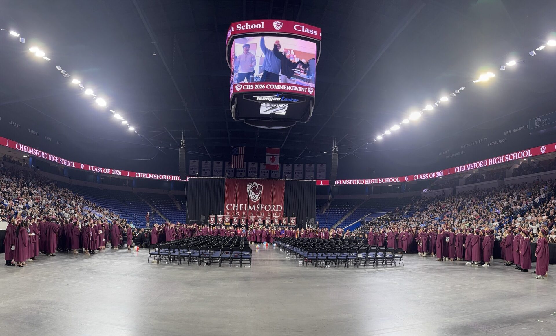 Lipdub Video Members of the Class of 2026 and the rest of the audience look up at the Jumbotron to view a surprise lip dub video during Chelmsford High School's Graduation ceremony on June 6, 2026.