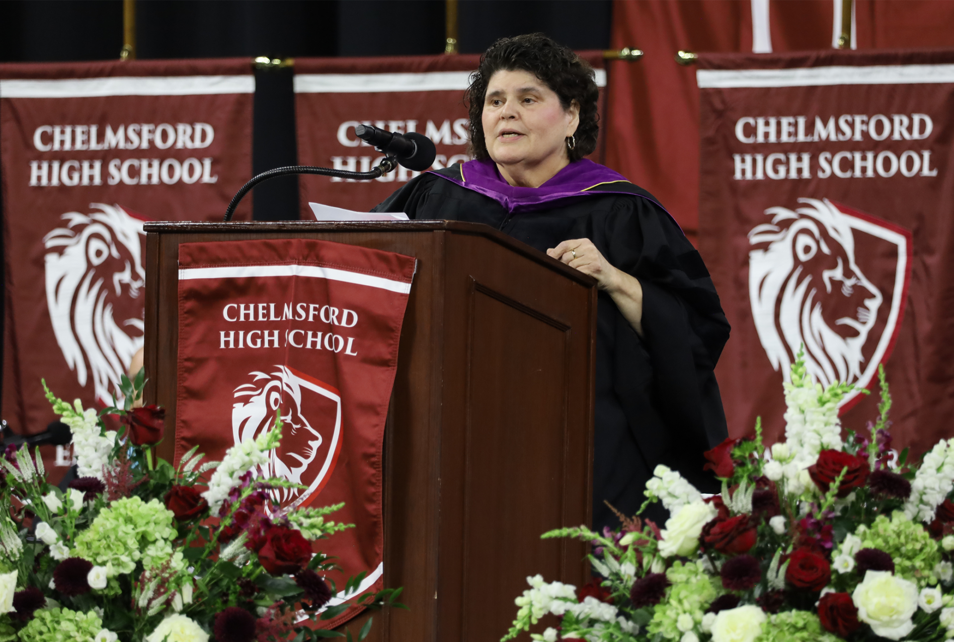 Maria Santos School Committee Chairperson Maria Santos gives her address to those gathered for the graduation of Chelmsford High School's Class of 2026 on June 6.