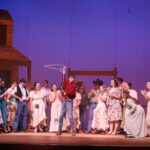 Chelmsford High School junior Adam Pinto, center, has been nominated for an METG Award for Best Performance - Male Supporting Role for his portrayal of Will Parker in the CHS Theatre Guild's production of "Oklahoma!"