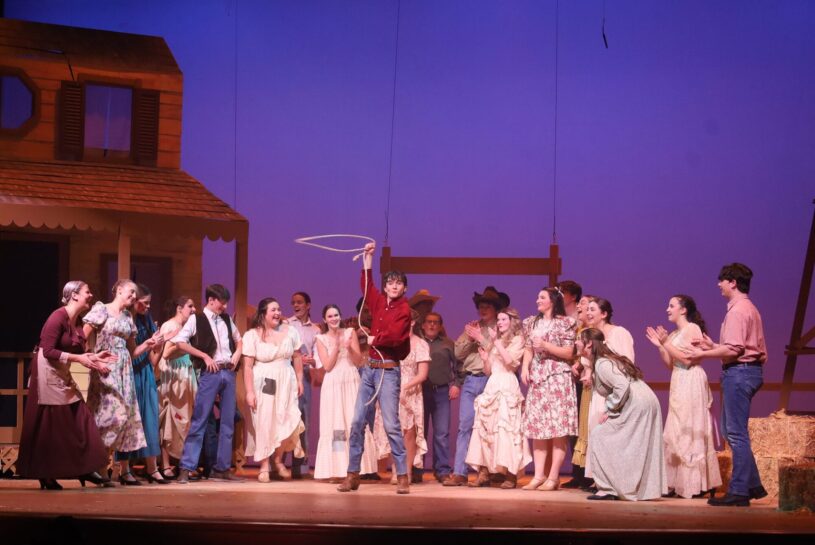 Chelmsford High School junior Adam Pinto, center, has been nominated for an METG Award for Best Performance - Male Supporting Role for his portrayal of Will Parker in the CHS Theatre Guild's production of "Oklahoma!"