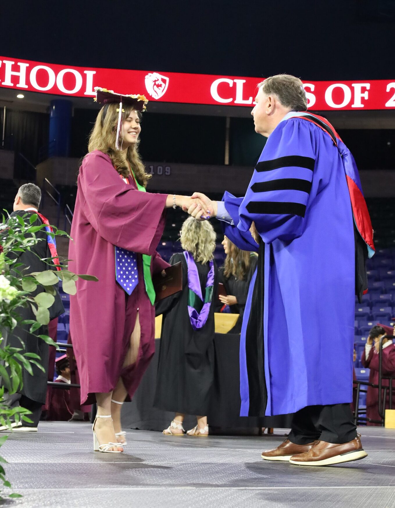 Senior Super Shake Superintendent Dr. Jay Lang shakes the hand of a graduating senior during the commencement exercises for Chelmsford High School's Class of 2026 on June 6.