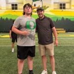 Chelmsford High lineman Brady Mahoney, left, poses with University of Oregon football coach Dan Lanning when Mahoney attended the school’s camp recently. Mahoney will be a junior at Chelmsford in the fall.