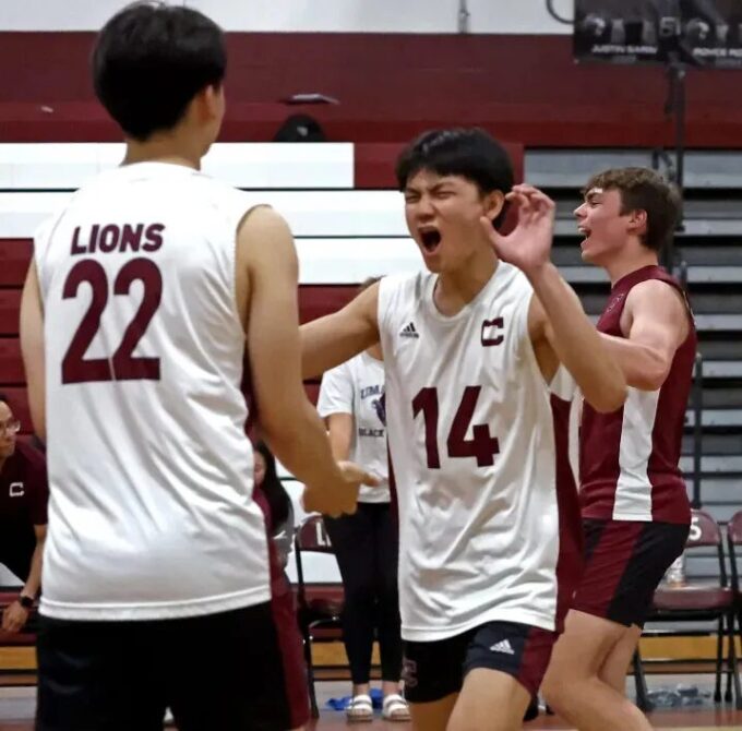 Chelmsford’s Ridty Tauch, right, was named the MVC’s Div. 1 boys volleyball Player of the Year.