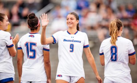 Chelmsford’s Eliana Parreira is all smiles as she’s introduced prior to a game against UMass at Cushing Field in Lowell. She’s one of the top defensive players in the America East Conference.