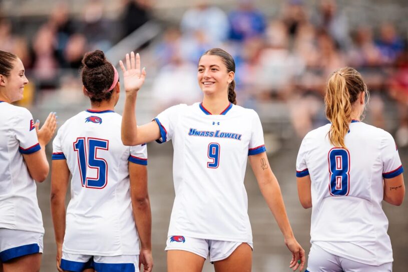 Chelmsford’s Eliana Parreira is all smiles as she’s introduced prior to a game against UMass at Cushing Field in Lowell. She’s one of the top defensive players in the America East Conference.