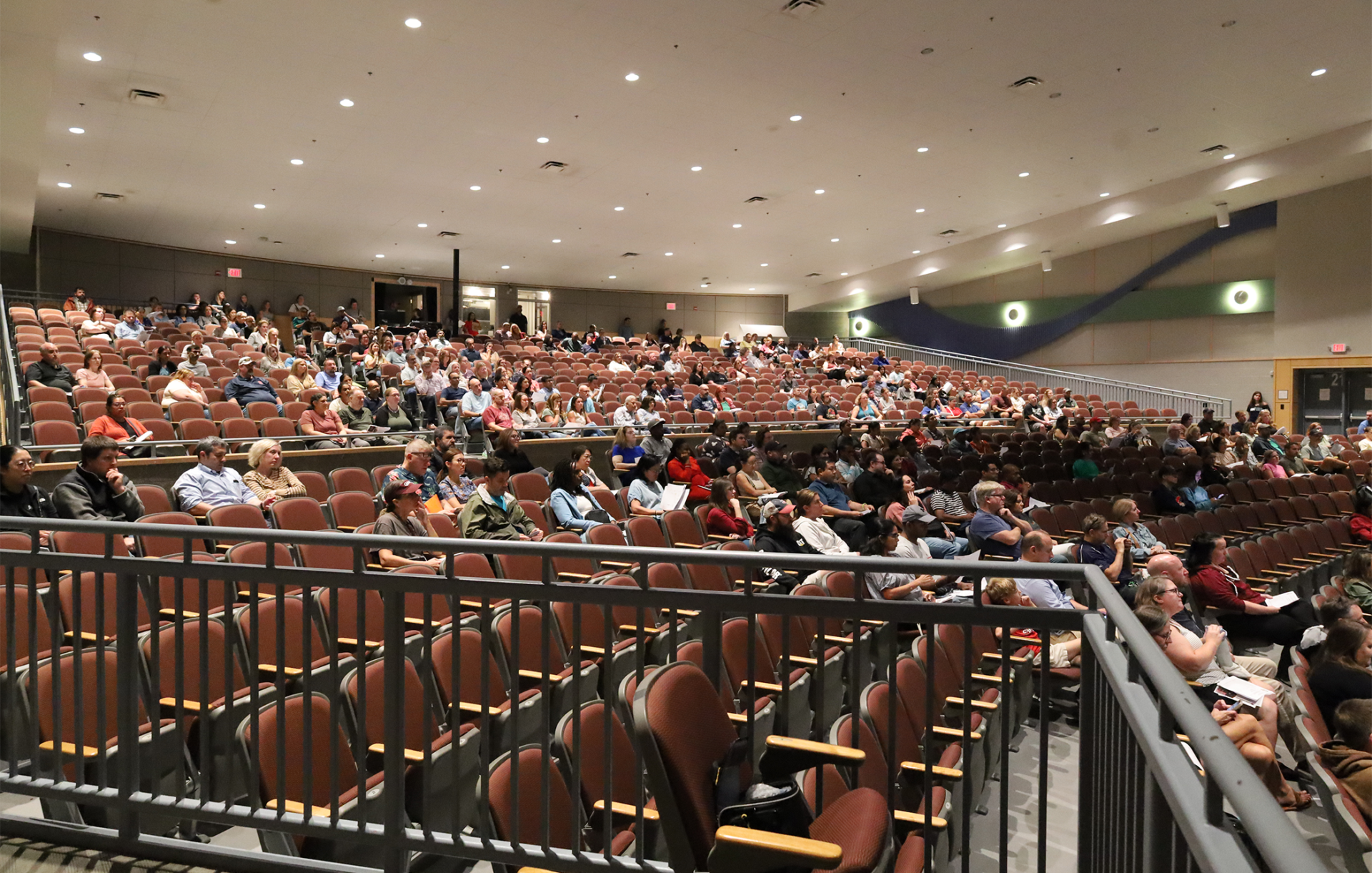Parents and guardians of ninth grade students attend a freshman parent meeting during the Chelmsford High School open house event on Thursday, Sept. 17, 2026.