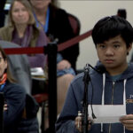 Chelmsford High School Ecology Club member Loi Duong speaks in favor of the proposed ban on single-use black plastic food containers at local food establishments.