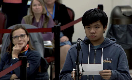 Chelmsford High School Ecology Club member Loi Duong speaks in favor of the proposed ban on single-use black plastic food containers at local food establishments.