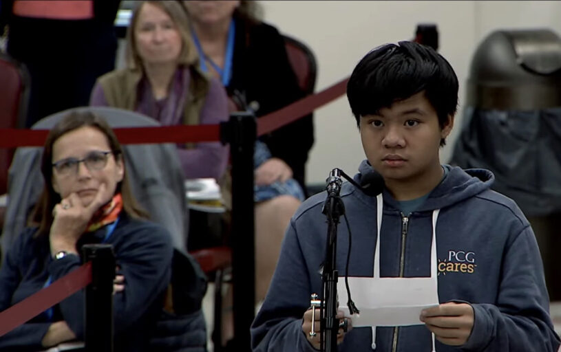 Chelmsford High School Ecology Club member Loi Duong speaks in favor of the proposed ban on single-use black plastic food containers at local food establishments.