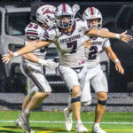 Chelmsford’s Skyler DeJesus, right, celebrates his touchdown with Colin Clark and Quinn Stefanini during Friday’s MVC football game against Tewksbury at Doucette Field in Tewksbury. Chelmsford earned a 28-21 win.