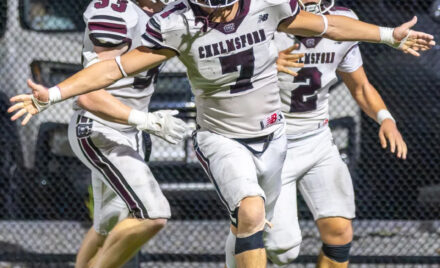 Chelmsford’s Skyler DeJesus, right, celebrates his touchdown with Colin Clark and Quinn Stefanini during Friday’s MVC football game against Tewksbury at Doucette Field in Tewksbury. Chelmsford earned a 28-21 win.