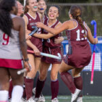 Chelmsford’s Cora Grundy, third from left, celebrates with teammates after scoring the first of her two goals during Monday’s MVC field hockey game against Lowell. Chelmsford won 3-2.