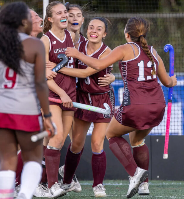 Chelmsford’s Cora Grundy, third from left, celebrates with teammates after scoring the first of her two goals during Monday’s MVC field hockey game against Lowell. Chelmsford won 3-2.